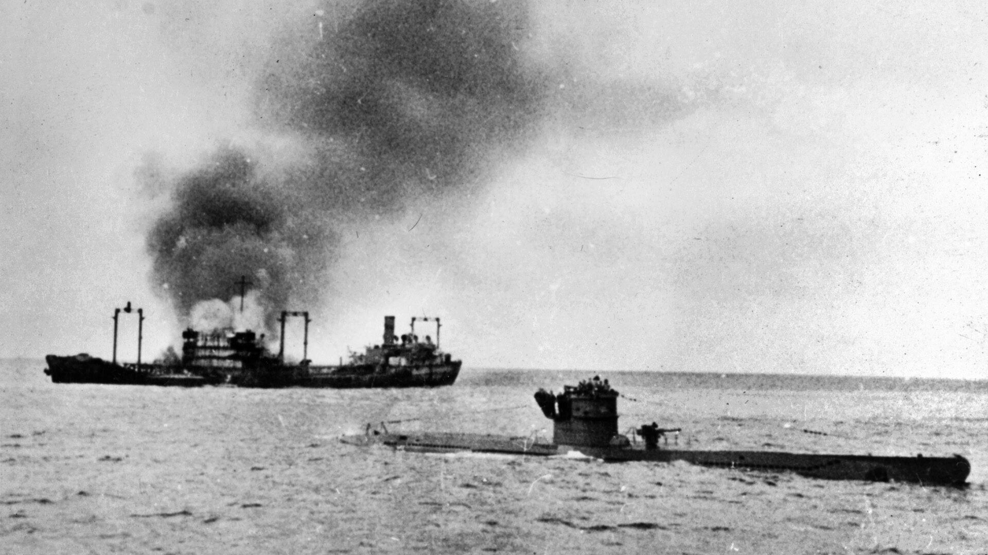 U-boat in foreground of an attack.